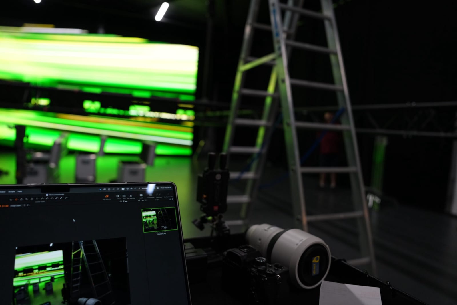 Camera and tethered workstation facing the curved LED volume on the Lando Norris and Monster Energy campaign set.